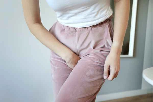 older woman running to the toilet because of urinary incontinence Edmonton